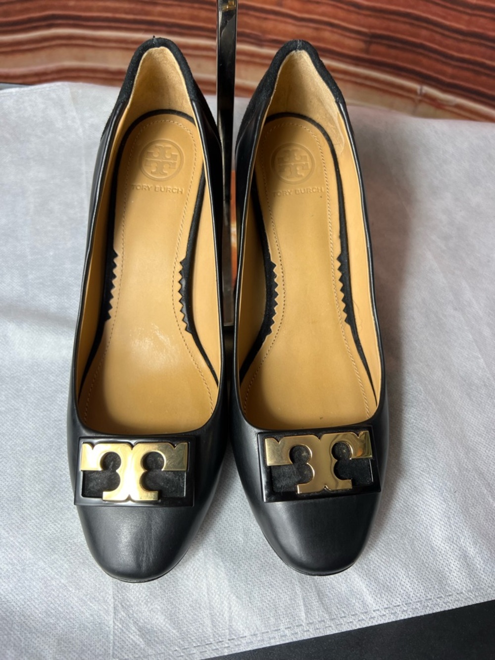 Tory Burch Gigi T Logo Pumps featuring a black leather and suede upper 6.5